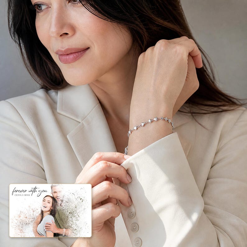 Linked Hearts Steel Bracelet worn by an adult in a polished evening lifestyle scene.