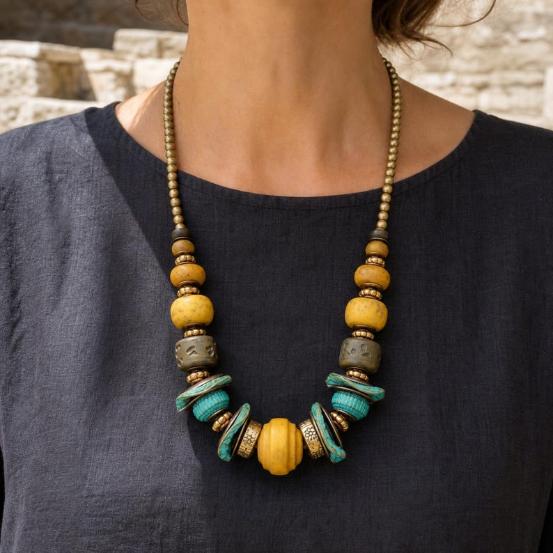 Three-piece handmade necklace set featuring rose gold and gray beaded necklace, rose gold and gray beaded necklace and rose gold and gray beaded necklace, displayed together to show the coordinated colors and beadwork