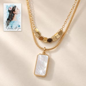 Mother of Pearl Necklace, hero view. A personalized digital greeting card is shown alongside.