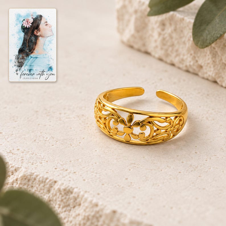 Golden Bloom Filigree Ring shown on a clean white catalog background for an unobstructed product view. A personalized digital greeting card is shown alongside.