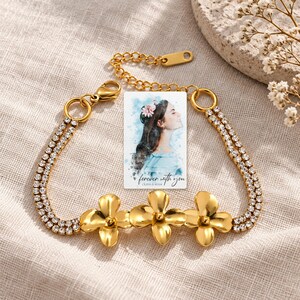 Gold Tone Flower Bracelet, linen flatlay view. A personalized digital greeting card is shown alongside.