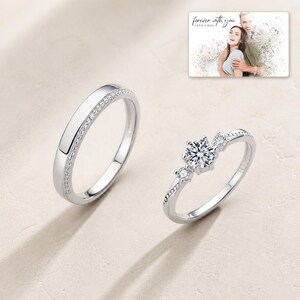 First Sight 925 Promise Rings photographed in warm natural window light in an elegant home setting.