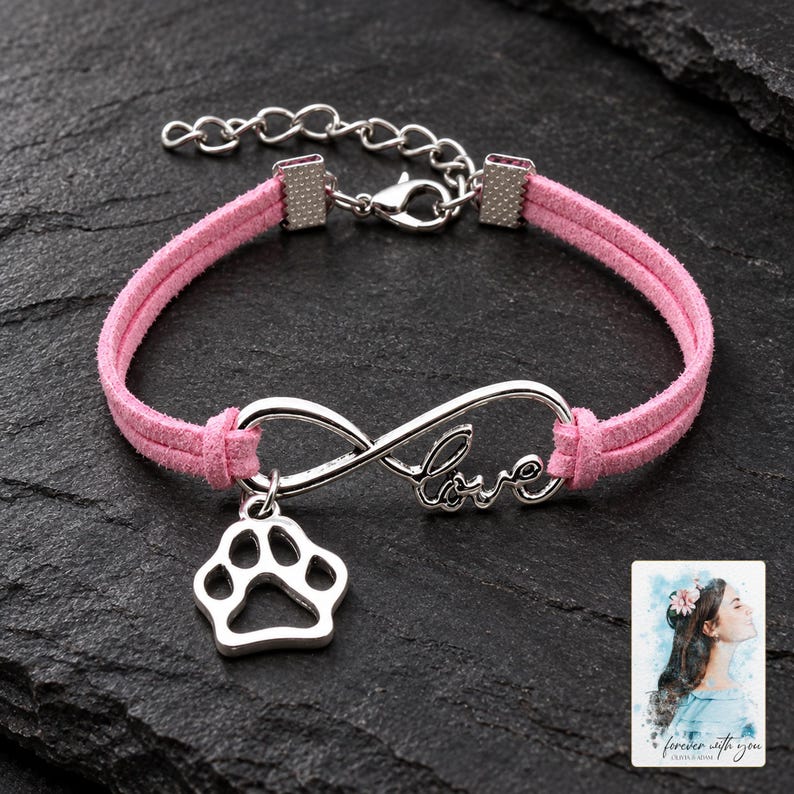 Infinity Love Paw Bracelet, shown against a dark background. A sample personalized digital greeting card is shown alongside.