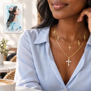 Golden Faith Layered Cross Necklace worn by an adult in a natural daytime lifestyle scene. A personalized digital greeting card is shown alongside.