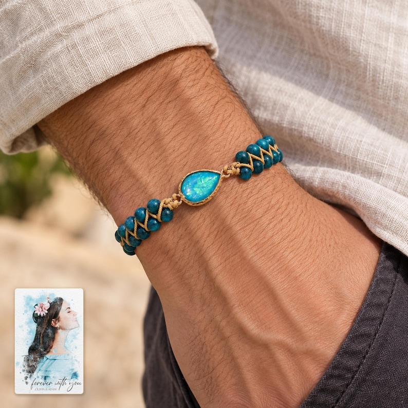 Blue Teardrop Cord Bracelet, worn with daytime clothing. A sample personalized digital greeting card is shown alongside.