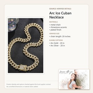 May include: An Arc Ice Cuban necklace featuring a gold-toned metal chain with a plated finish and rhinestone accents. The chain length is 20 inches. The necklace includes a rectangular box clasp closure and is displayed on a dark background.