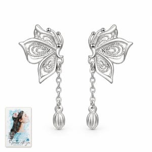 Butterfly Drop Earrings, shown against a light background. A sample personalized digital greeting card is shown alongside.