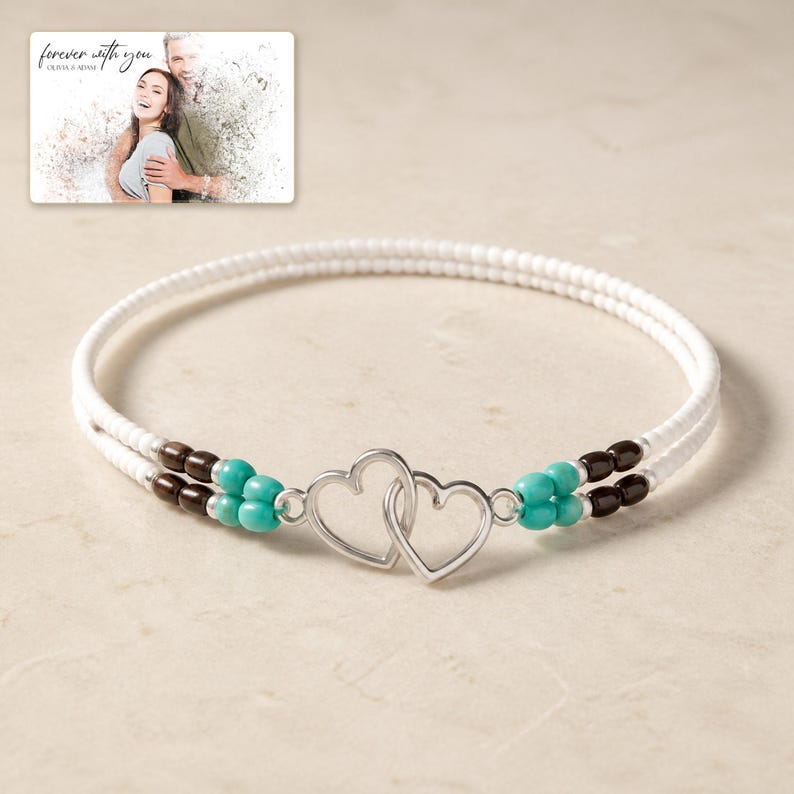 Tidal Hearts Beaded Anklet photographed in warm natural window light in an elegant home setting.