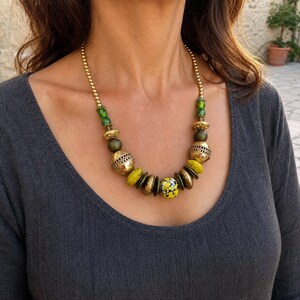 Three-piece handmade necklace set featuring gray and brown beaded necklace, gray and brown beaded necklace and brown and gray beaded necklace, displayed together to show the coordinated colors and beadwork