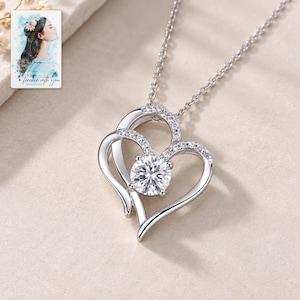 Double Heart Pendant Necklace, close-up of the details. A sample personalized digital greeting card is shown alongside.