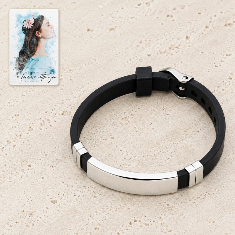 Close view of the bracelet's plain polished bar, black gap and two-segment silver-tone accent. A personalized digital greeting card is shown alongside.