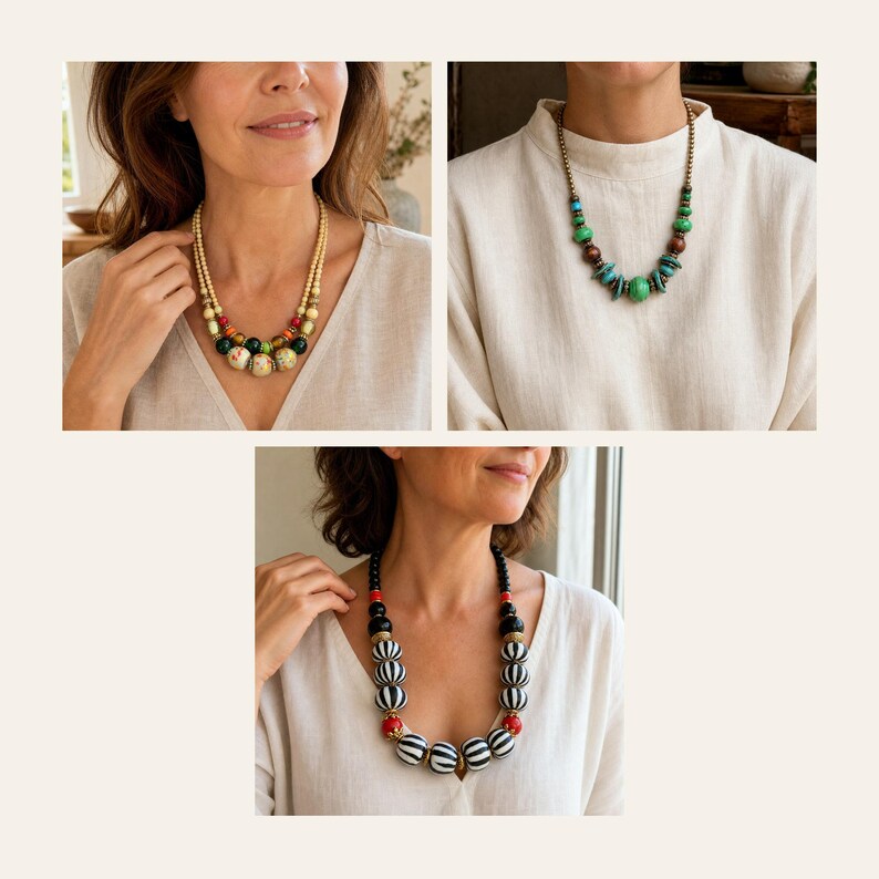 May include: Three distinct necklaces featuring varied bead designs. One necklace has multi-coloured floral beads, another displays green and turquoise stones with metallic accents, and the third showcases large black and white striped beads with red accents.