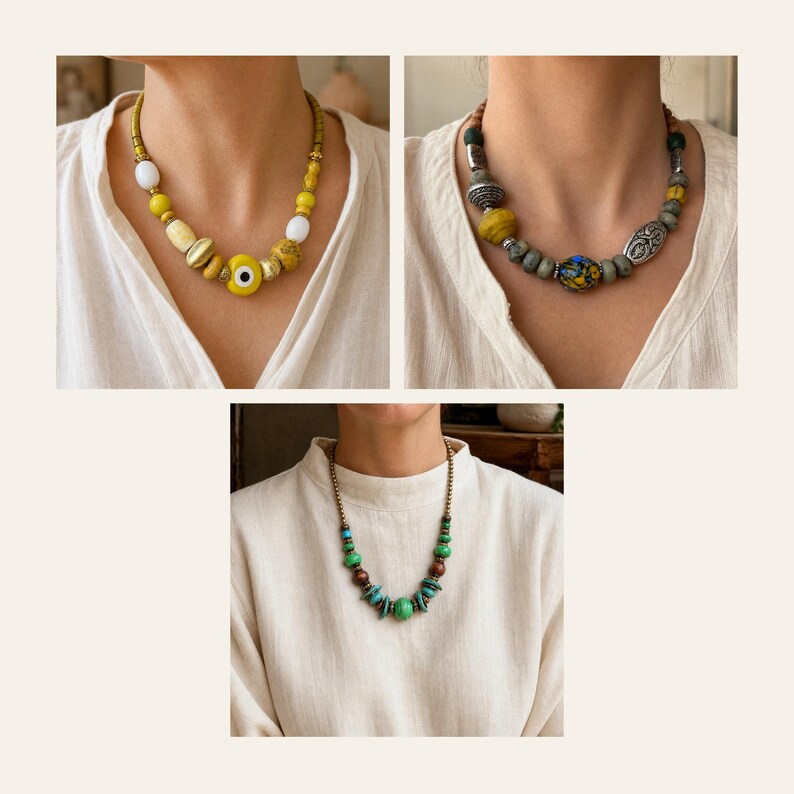 May include: Three necklaces featuring varied bead designs. The first has yellow and white beads with a central evil eye charm. The second displays grey, yellow, and patterned beads with metallic accents. The third features green, brown, and turquoise beads.