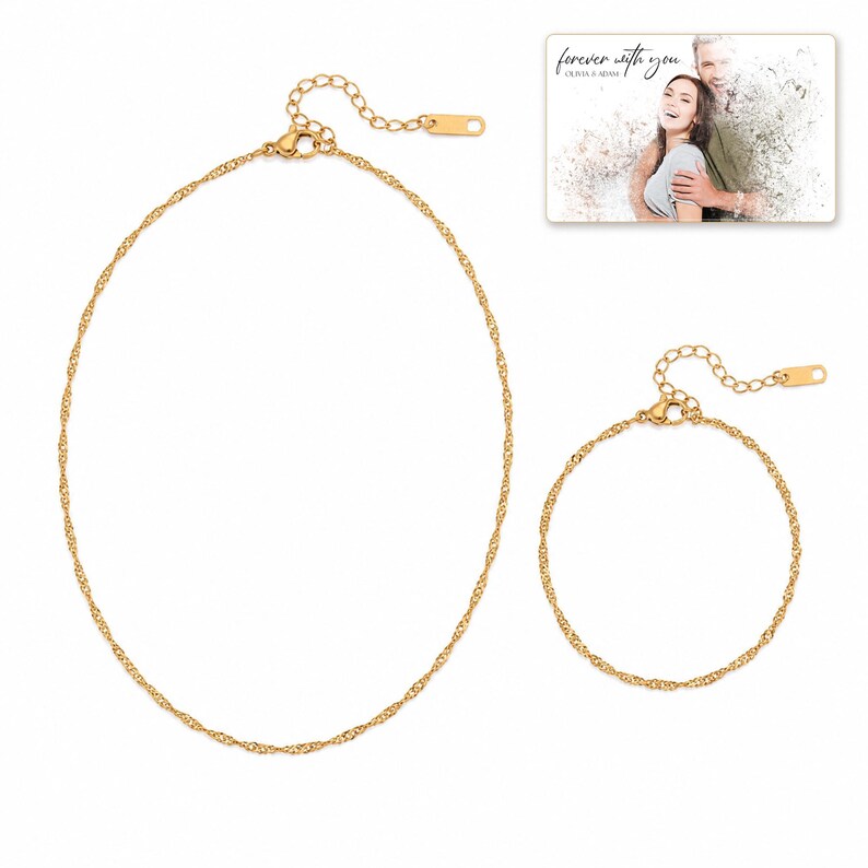 Golden Waterline Chain shown during a believable gift-giving moment between adults with the exact jewelry visible.