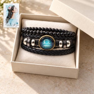 Zodiac Sign Bracelet, displayed in a presentation box. A sample personalized digital greeting card is shown alongside.
