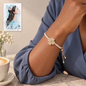 Golden Petal Slider Bracelet worn by an adult in a natural daytime lifestyle scene. A personalized digital greeting card is shown alongside.