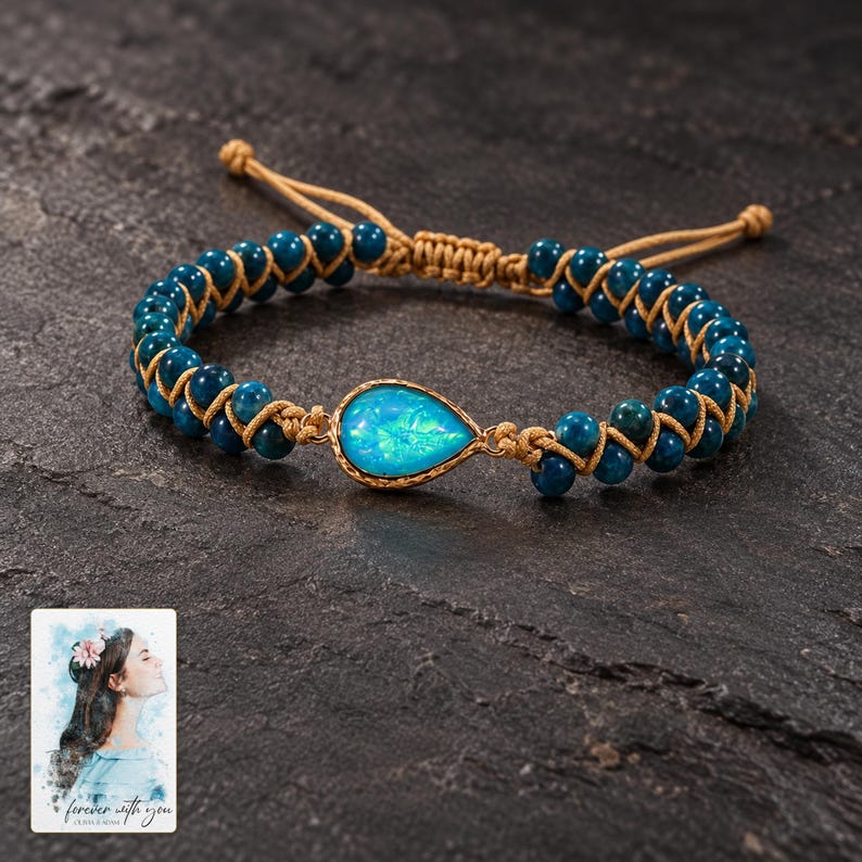 Blue Teardrop Cord Bracelet, shown against a dark background. A sample personalized digital greeting card is shown alongside.