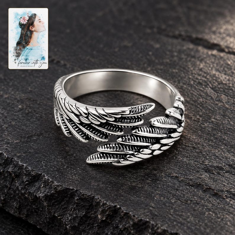 Angel Wings Wrap Ring, shown against a dark background. A sample personalized digital greeting card is shown alongside.