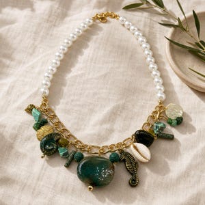 Silver and Bronze Statement Beaded Necklace presented in an open jewelry gift box on natural linen