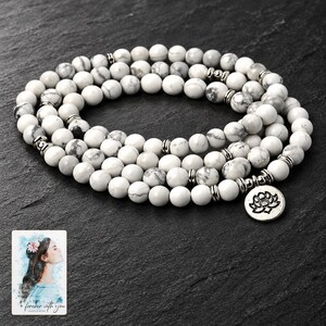 White Bead Wrap Bracelet, shown against a dark background. A sample personalized digital greeting card is shown alongside.