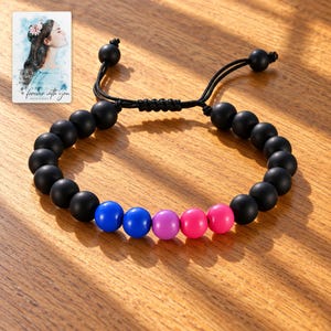 Black Bead Bracelet, sunlit home view. A personalized digital greeting card is shown alongside.