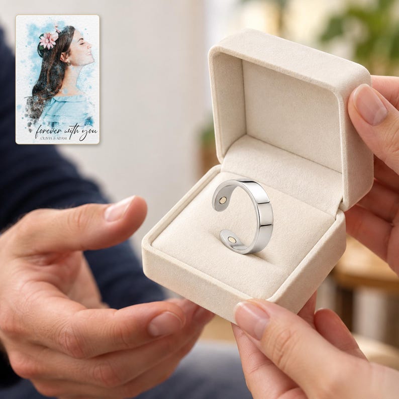 An adult receiving an open ivory ring box containing the polished silver-tone band. A personalized digital greeting card is shown alongside.