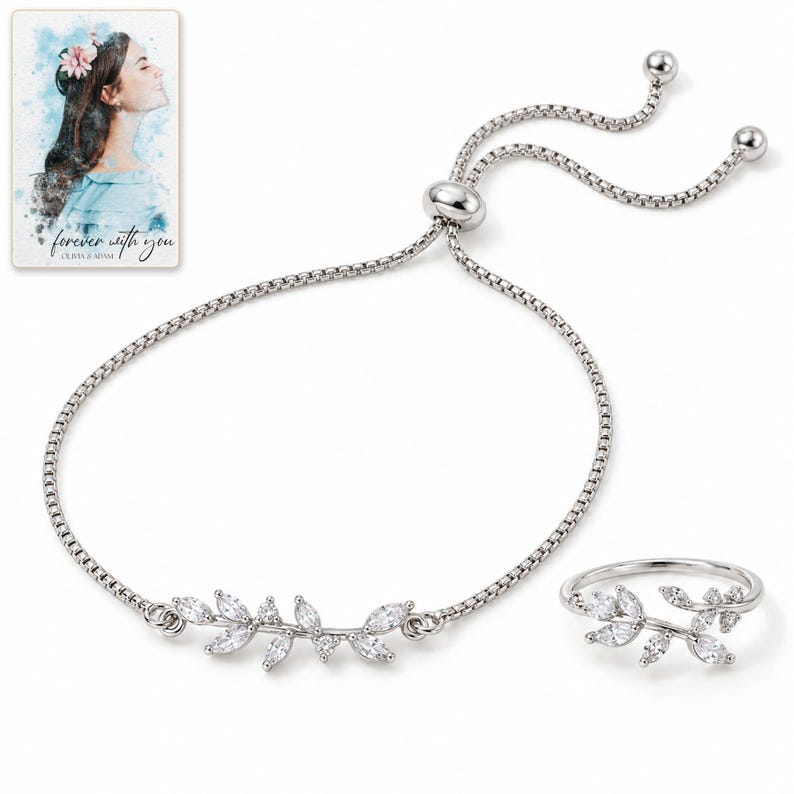Two-piece silver-tone botanical jewelry set on white, with bracelet, double-vine ring, adjustable slider and two ball-ended tails. A personalized digital greeting card is shown alongside.