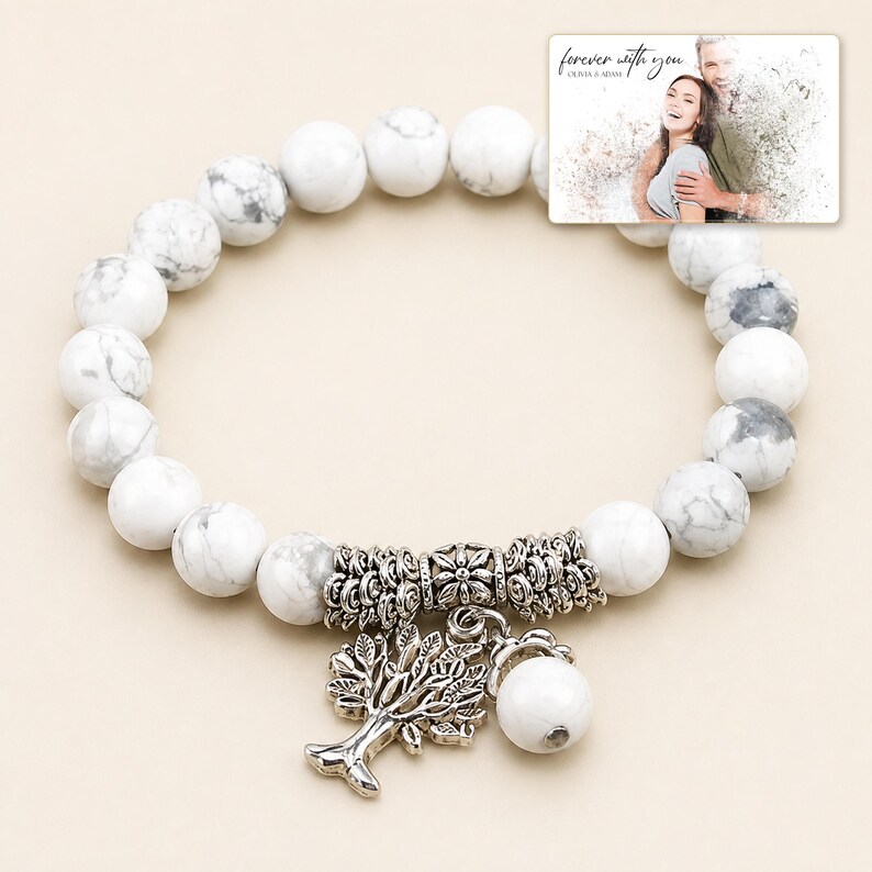 White and gray bead bracelet with silver-tone tree and hanging bead details, display view. A personalized greeting-card example appears in the corner.