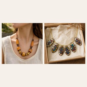 May include: A necklace featuring large amber-colored cylindrical beads and gold-toned spacers, alongside a second necklace with a gold-toned chain and five oval-shaped pendants inlaid with a mosaic of small, multi-colored geometric pieces.