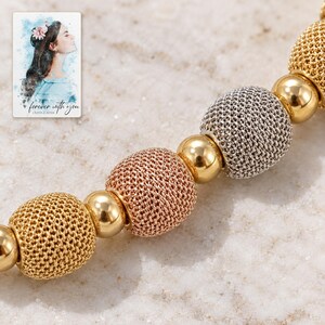 Metallic Bead Jewelry Suite shown in a close macro view highlighting the visible texture, texture and construction details. A personalized digital greeting card is shown alongside.