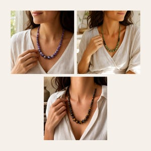 May include: A collection of three beaded necklaces featuring round polished stones. One necklace consists of purple amethyst beads, another features green jade-like beads, and the third is composed of brown and gold tiger eye gemstone beads.