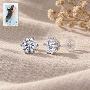 Moissanite Stud Earrings, laid on fabric. A sample personalized digital greeting card is shown alongside.