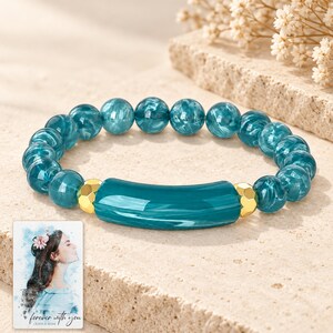 Peacock Tide Bar Bracelet shown as the main Etsy hero photograph with a clear view of the complete design. A personalized digital greeting card is shown alongside.