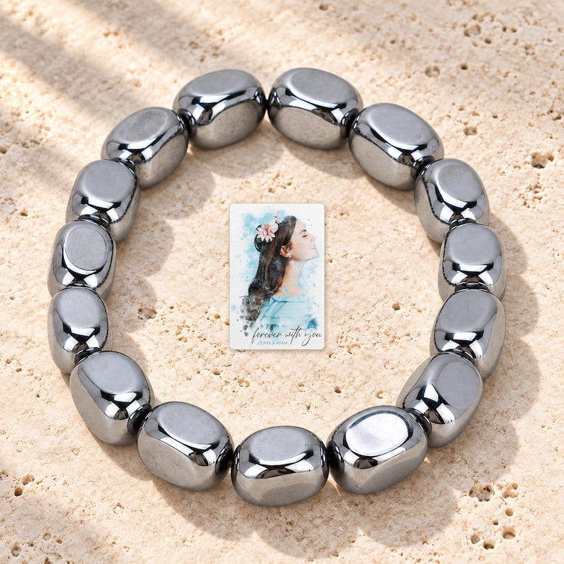 Metallic Grey Bead Bracelet, sunlit home view. A personalized digital greeting card is shown alongside.