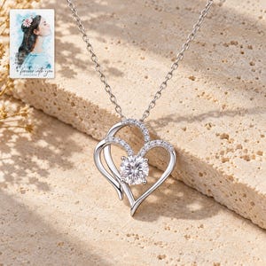 Double Heart Pendant Necklace, shown in natural light. A sample personalized digital greeting card is shown alongside.