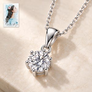 Moissanite Pendant Necklace, close-up of the details. A sample personalized digital greeting card is shown alongside.