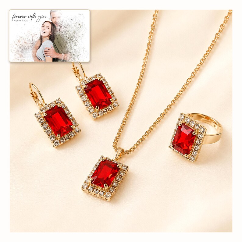 Red rectangular-stone necklace, matching earrings and ring, catalog view. A personalized greeting-card example appears in the corner.
