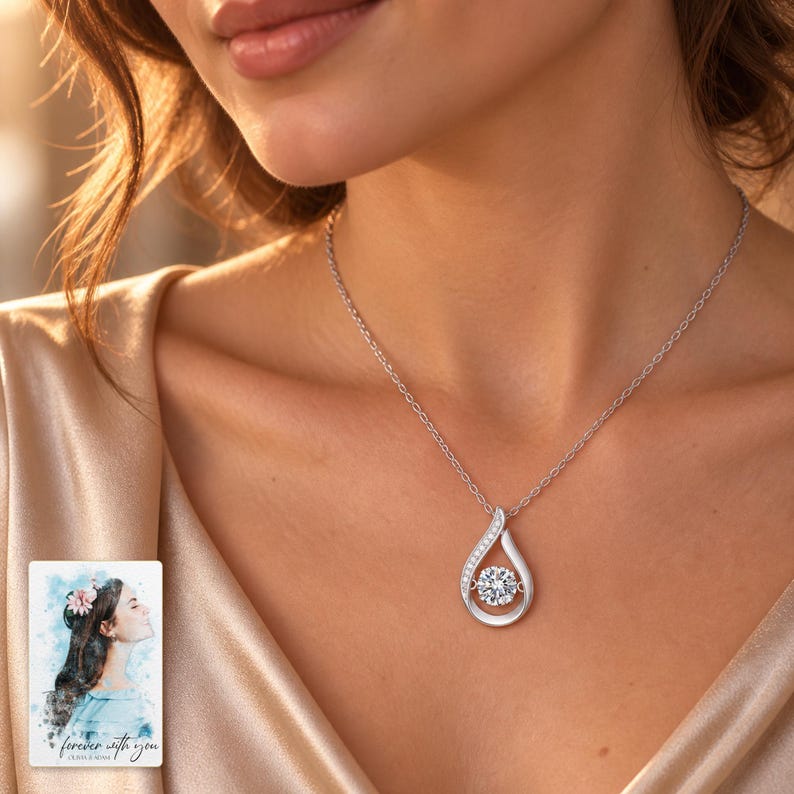 Moissanite Teardrop Necklace, worn with evening clothing. A sample personalized digital greeting card is shown alongside.