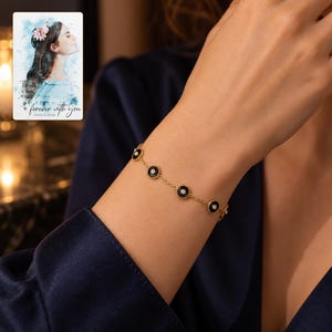 Black Disc Bracelet, worn with evening clothing. A sample personalized digital greeting card is shown alongside.