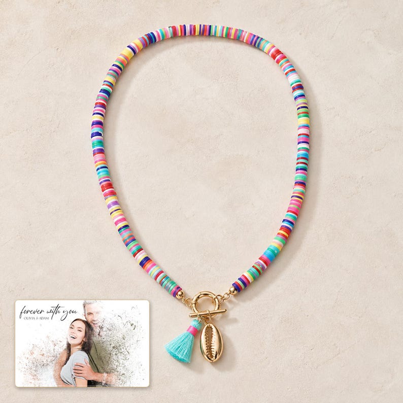Blue Fiesta Shell Necklace photographed in warm natural window light in an elegant home setting.