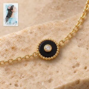Black Disc Bracelet, close-up of the details. A sample personalized digital greeting card is shown alongside.