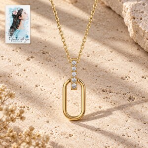 Oval Link Moissanite Necklace, shown in natural light. A sample personalized digital greeting card is shown alongside.