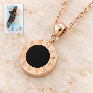 Roman Numeral Necklace, hero view. A personalized digital greeting card is shown alongside.