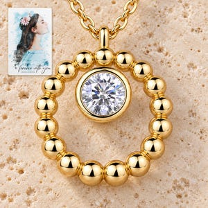 Moissanite Circle Necklace, hero view. A personalized digital greeting card is shown alongside.