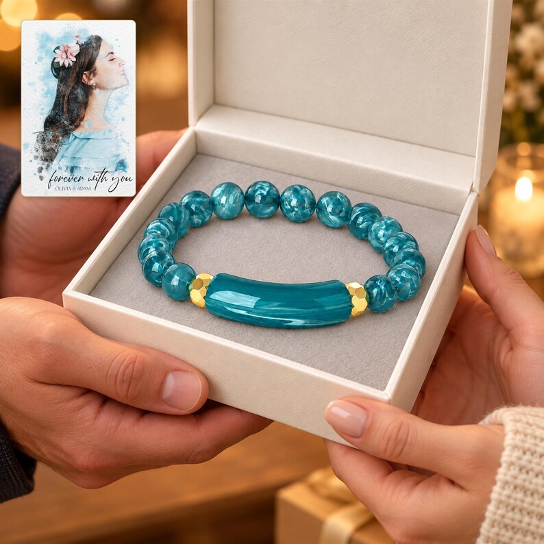 Peacock Tide Bar Bracelet shown during a warm gift-receiving moment between adults with the jewelry visible. A personalized digital greeting card is shown alongside.