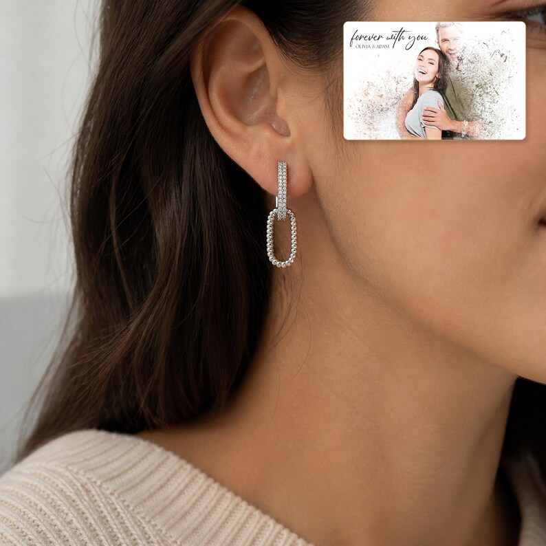 Silver Current Zircon Drops worn by an adult in a polished evening lifestyle scene.