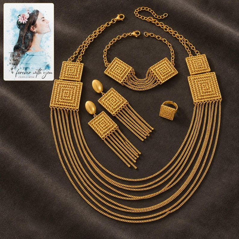 Golden Tassel Jewelry Suite styled against a dark luxury surface with the exact product finish clearly visible. A personalized digital greeting card is shown alongside.