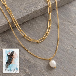 Kona pearl style Layers Necklace styled against a dark luxury surface with the exact product finish clearly visible. A personalized digital greeting card is shown alongside.