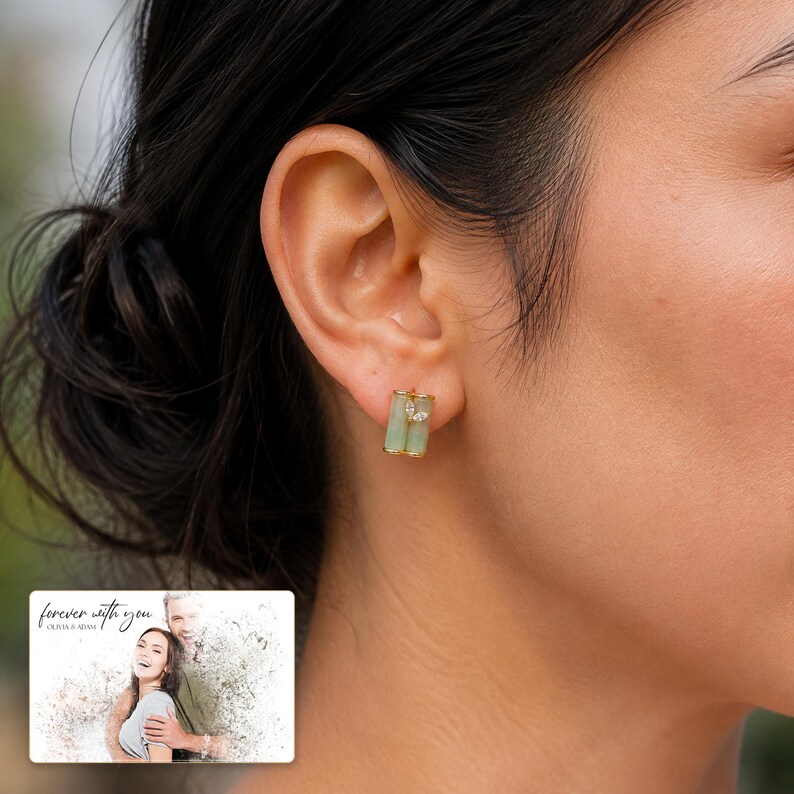 Pale green bamboo-shaped stud earrings with gold-tone edges, worn view. A personalized greeting-card example appears in the corner.