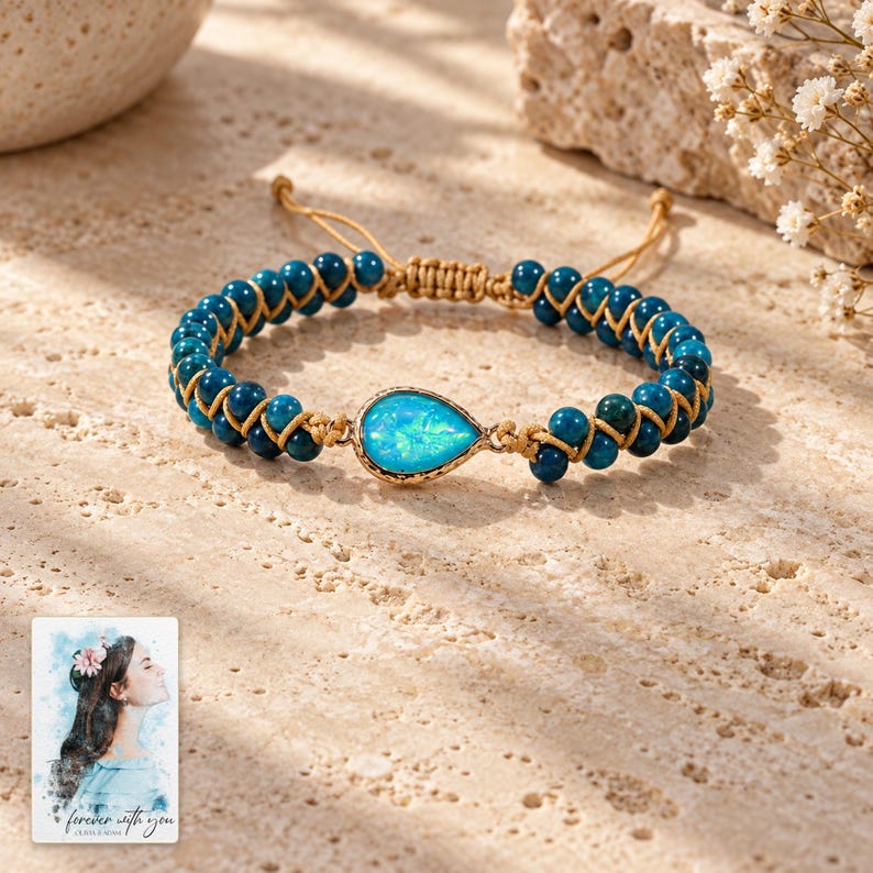 Blue Teardrop Cord Bracelet, shown in natural light. A sample personalized digital greeting card is shown alongside.